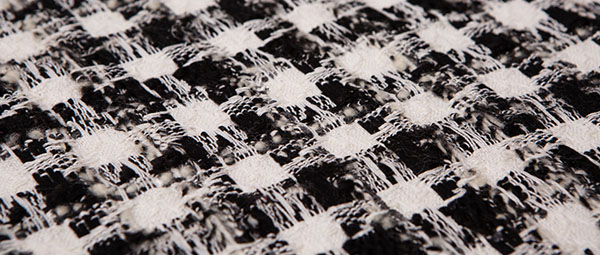 les tweeds fantaisies noir et blanc à carreau